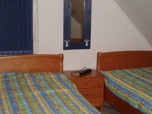 Slaapkamer met 2 eenpersoonsbedden